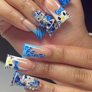 Blue and White Nail Art with Rhinestones